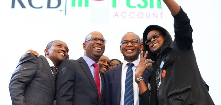 Selfie (from L-R) Maina Kageni, Bob Collymore (CEO, Safaricom Ltd), Joshua Oigara (CEO, KCB Group), and LL COOL K, at the KCB Mpesa Account Launch at Sankara Hotel, Nairobi