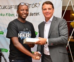 L-R, Kevin Oyugi, winner of an iPad and Richard Alden, CEO, Wananchi Group
