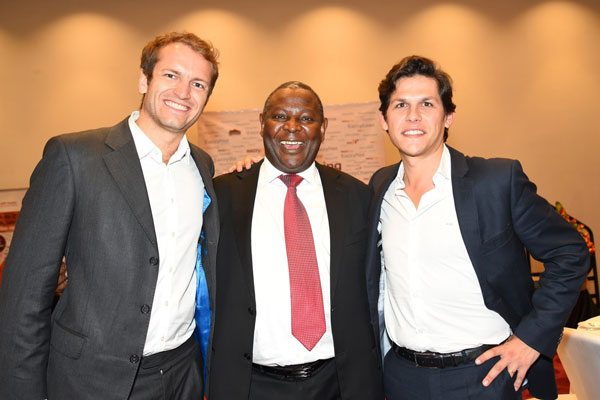 Equity Bank CEO James Mwangi shares a light moment with Jumia Kenya MD Sam Chappatte (Left) and Juan Seco, Finance Manager (Right).jpg